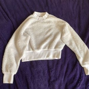 White fluffy sweater. Worn 5 times.